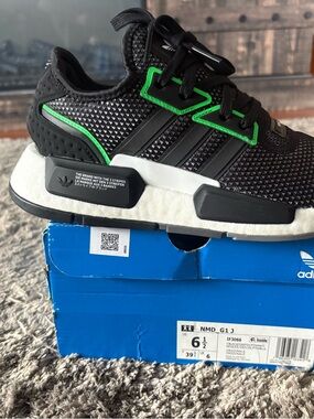 adidas Black Sneakers w| Neon Green Accents.This is a mens 6 1/2, women’s 7 1/2